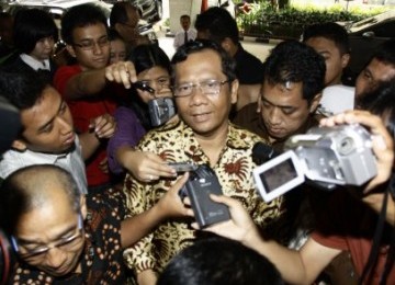 Ketua Mahkamah (MK) Konstitusi Mahfud MD, saat tiba di Bareskrim Mabes Polri, Jakarta, Kamis (29/9). 