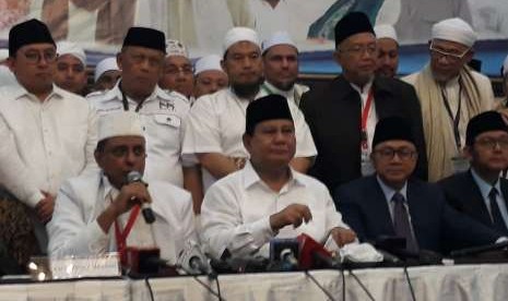 GNPF Ulama chairman ustaz Yusuf Muhammad Martak, Prabowo Subianto and Zulkifli Hasan attends Ijtima' Ulama II at Grand Cempaka hotel, Jakarta, Sunday (Sept 16)