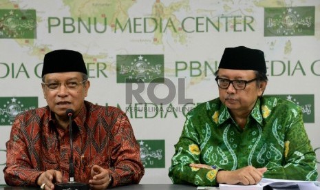 Ketua Umum Pengurus Besar Nahdlatul Ulama (PBNU) Said Aqil Siradj didampingi Ketua Steering Committee Panitia Muktamar NU ke-33 Slamet Effendy Yusuf memberikan keterangan terkait laporan akhir persiapan pelaksanaan Muktamar NU di Kantor PBNU,Jakarta, Jumat