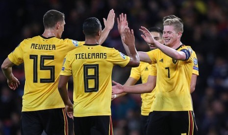 Kevin de Bruyne dan rekannya merayakan kemenangan Belgia 4-0 atas Skotlandia, di King Baudouin Stadium, Brussels, Selasa (10/9) WIB dinihari.