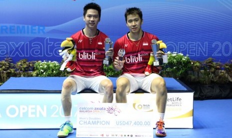 Kevin Sanjaya Sukamuljo (kiri) dan Marcus Fernaldi Gideon.