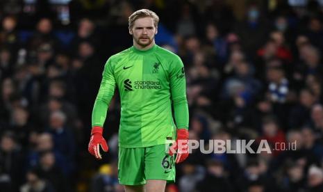 Kiper Liverpool Caoimhin Kelleher bereaksi pada pertandingan sepak bola Liga Premier Inggris antara Chelsea FC dan Liverpool FC di London, Inggris, Senin (3/1) dini hari WIB. 