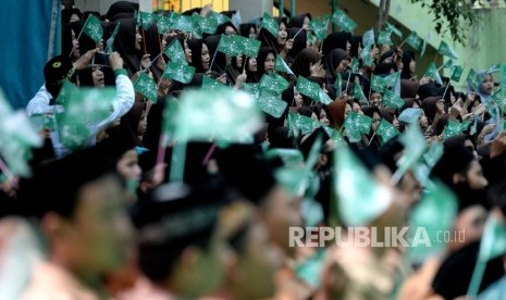 Kirab Hari Santri Nasional. Penyambutan rombongan Hari Santri Nasional di Ponpes Asshiddiqiyah, Jakarta, Sabtu (21/10).