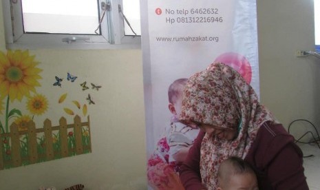 Klinik Pratama Rumah Zakat Bantul mengadakan Pijat Bayi.