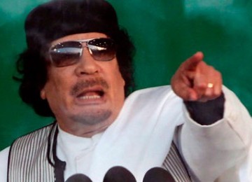 Kolonel Muammar Qaddafi.