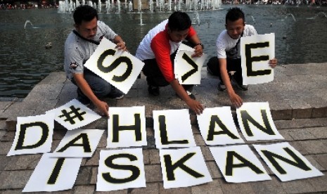 Komunitas Dahlanis melakukan aksi di Bundaran Hotel Indonesia, Jakarta, Ahad (7/6).