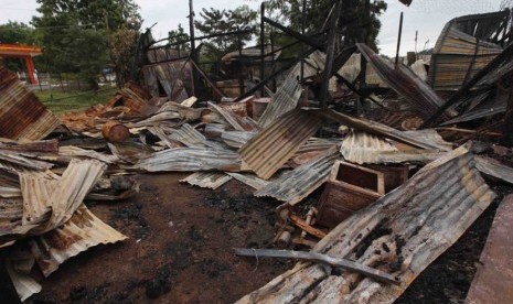   Kondisi bangunan yang terbakar akibat konflik di Thandwe, Rakhine, Myanmar, Rabu (2/10).  (AP/Khin Maung Win)