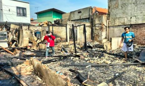 Kondisi rumah yang terbakar di kawasan Taman Sari, Jakarta Barat, Selasa (13/9/2022). 