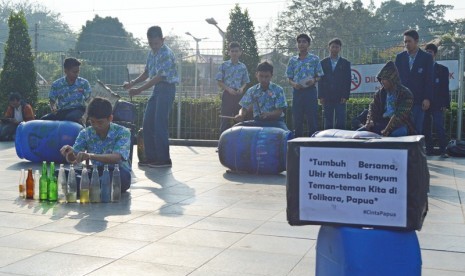 Konser Tumbuh Bersama Ukir Kembali Senyum Teman-Teman Kita Tercinta di Tolikara.