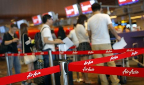 Konter Air Asia di bandara Changi, Singapura.