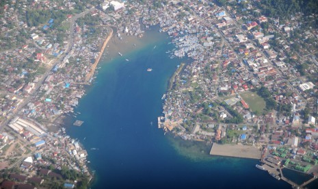 Kota Manokwari, Provinsi Papua Barat dari udara. Manokwari mengalami dampak perubahan iklim. Ilustrasi.