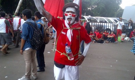 Kurniawan, suporter setia tim nasional di Satdion GBK, Sabtu (23/3)