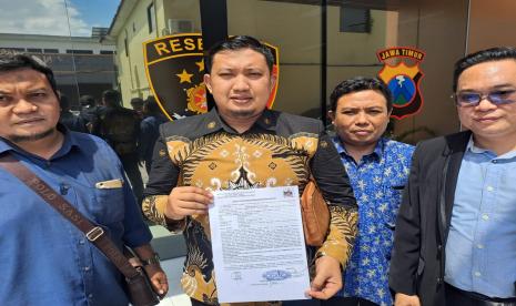 Laporan pengaduan Pimpinan Daerah Muhammadiyah Surabaya terhadap peneliti BRIN Andi Pangerang (AP) Hasanuddin ke Polda Jatim. 