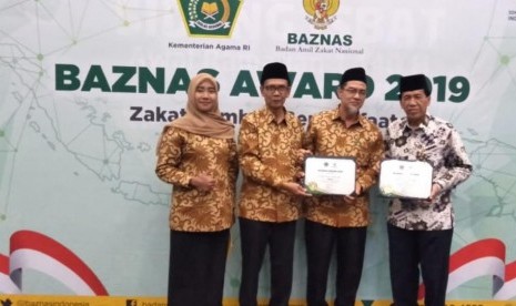 Laporan tahunan Baznas Muba dinobatkan terbaik 3 (tiga) se-Indonesia dalam ajang Baznas Award 2019 bertema 