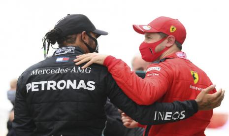 Lewis Hamilton (Kiri) dan Sebastian Vettel (Kanan).