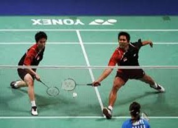 Lilyana Natsir (kiri) dan Ahmad Tontowi