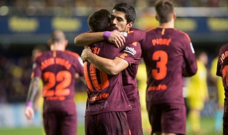 Lionel Messi dan Luis Suarez pada laga antara Barcelona versus Villarreal, Senin (11/12) dini hari WIB.