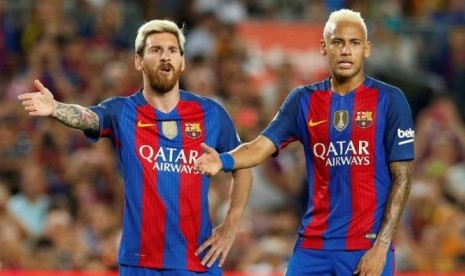 Lionel Messi dan Neymar saat bersama membela Barcelona.