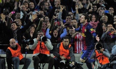 Lionel Messi usai mencetak gol ke gawang Atletico Madrid, Senin (17/12) dini hari.