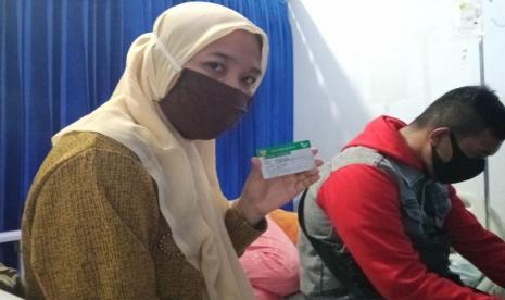 Lita, seorang peserta JKN-KIS dari segmen Pekerja Bukan Penerima Upah (PBPU).