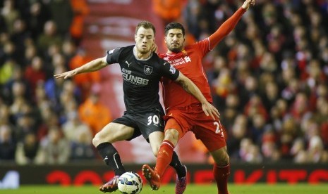  Liverpool's Emre Can in action with Burnley's Ashley Barnes 