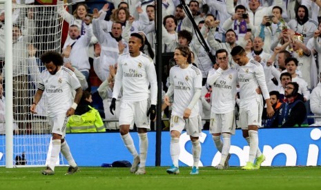 Los Blancos menang 2-1 atas Sevilla, Sabtu (18/1).