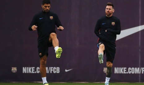 Luis Suarez dan Lionel Messi.