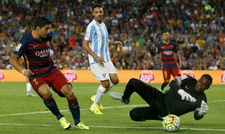 Luis Suarez gagal menaklukkan kiper Malaga Carlos Kameni