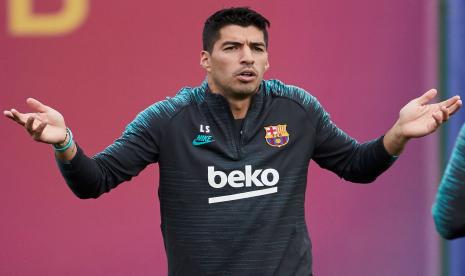 Luis Suarez bisa merapat ke Atletico Madrid setelah dilepas Barcelona.