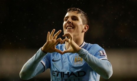 Manchester City's Stevan Jovetic celebrates scoring his side's fourth goal during the English Premier League soccer match between Tottenham Hotspur and Manchester City at White Hart Lane stadium in London, Wednesday, Jan. 29, 2014. 