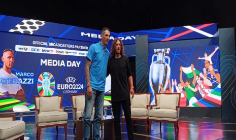 Marco Materazzi dan Charles Puyol. 