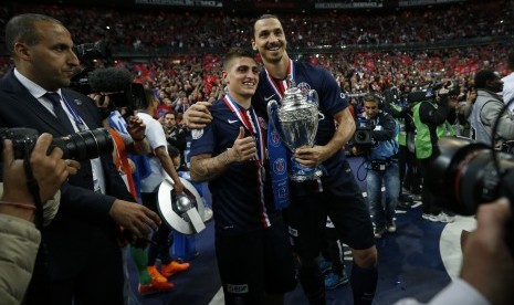 Marco Veratti bersama Zlatan Ibrahimovic saat Paris Saint-Germain menjuarai Piala Prancis pada 2015.