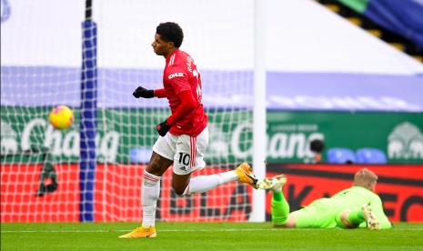 Marcus Rashford usai mencetak gol ke gawang Leicester City