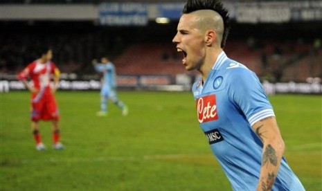 Marek Hamsik usai mencetak gol ke gawang Catania.