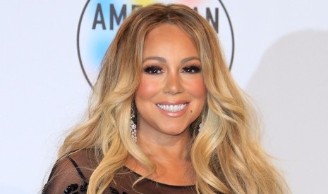 Mariah Carey disebut mencemarkan nama baik sang kakak.