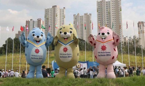 Maskot Asian Games 2014 Incheon (kiri-kanan) Barame, Vichuon dan Chumuro.