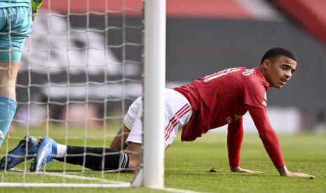 Mason Greenwood dari Manchester United bereaksi selama pertandingan sepak bola Liga Premier Inggris antara Manchester United dan Burnley FC di Manchester, Inggris, 18 April 2021. 