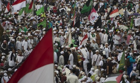 Massa berkumpul dalam Aksi 313 di Bundaran Patung Kuda, Jakarta, Jumat (31/3).