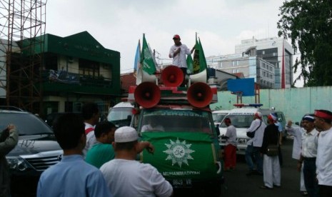 Massa muhammadiyah peserta aksi 55 mulai bergerak ke Gedung MA. 