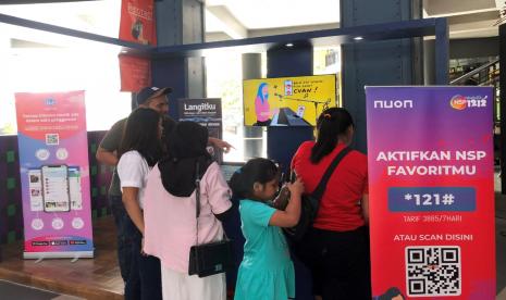 Masyarakat mengunjungi booth Nuon Digital Indonesia di gelaran IP Topia Talkshow 2023, beberapa waktu lalu. Pada kesempatan tersebut, Nuon menampilkan layanan produk digital music sebagai core business-nya, di antaranya Langit Musik, NSP1212 dan platform Langitku.