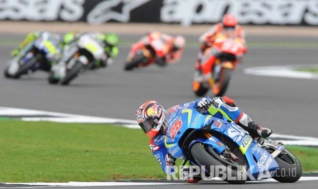 Maverick Vinales memimpin sejak lap pertama (Foto: AP Photo/Rui Vieira)