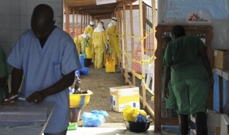 Medicins Sans Frontieres (MSF) health workers prepare at ELWA's hospital isolation camp in Monrovia on August 23, 2014.