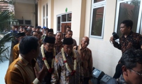 Menko Bidang Perekonomian, Darmin Nasution dan Gubernur Jawa Timur (Jatim) Soekarwo mengunjungi SMKN 4 Kota Malang, Kamis (13/12). 