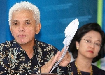 Menko Perekonomian sekaligus Ketua Umum PAN, Hatta Rajasa (kiri).