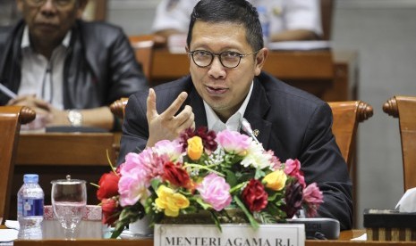 Menteri Agama Lukman Hakim Saifuddin menyampaikan penjelasan pada rapat kerja dengan Komisi VIII DPR di Kompleks Parlemen, Senayan, Jakarta, Senin (26/11/2018). 