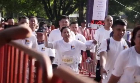 Menteri BUMN, Rini Soemarno saat mengikuti event Mandiri Jogja Marathon