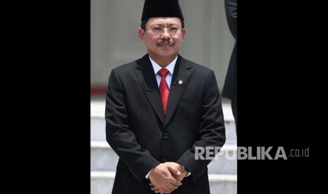 Menteri Kesehatan Terawan Agus Putranto bersiap mengikuti foto bersama seusai pelantikan menteri Kabinet Indonesia Maju di Beranda Halaman Istana Merdeka, Jakarta, Rabu (23/10/2019).