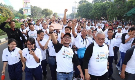 Menteri Ketenagakerjaan (Menaker) M Hanif Dhakiri dalam acara Fun Walk Skill For Future di BBPLK Bekasi pada Ahad (7/4).