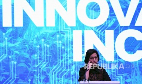 Menteri Keuangan Sri Mulyani Indrawati memberikan paparan pada Indonesia Fintech Summit & Expo 2019 di Jakarta Convention Center (JCC), Jakarta, Senin (23/9/2019).