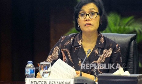 Menteri Keuangan Sri Mulyani indrawati menyampaikan rilis pencapaian dan evaluasi progrm pengampunan pajak atau tax amnesty di Gedung Kementerian Keuangan, Jakarta, Jumat (14/10). 